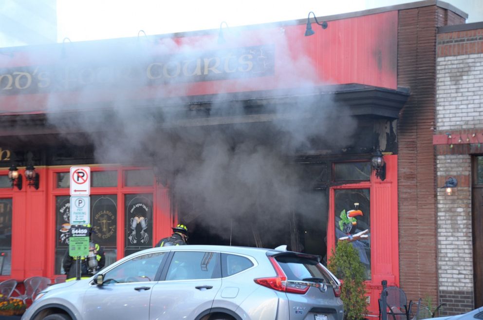 PHOTO: Irelands Four Courts Pub in Courthouse, Arlington, VA., caught fire after a car crashed into it on Aug. 12, 2022.