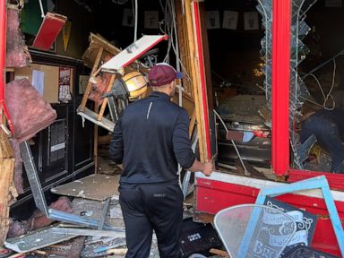 Police investigating after car crashes into pub, injuring 15