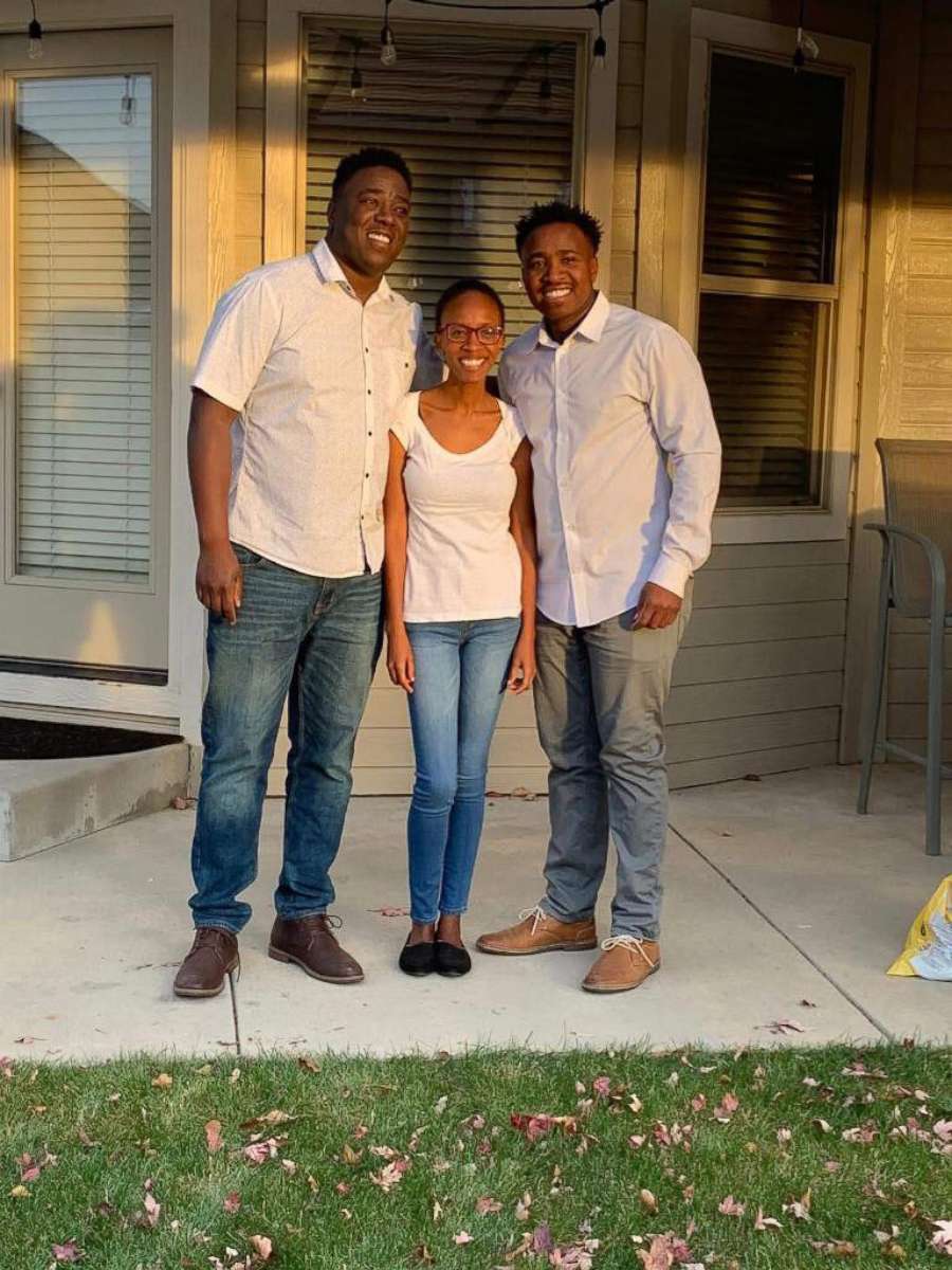 PHOTO: Irene Gakwa and brothers Chris and Kennedy stand in family photo.
