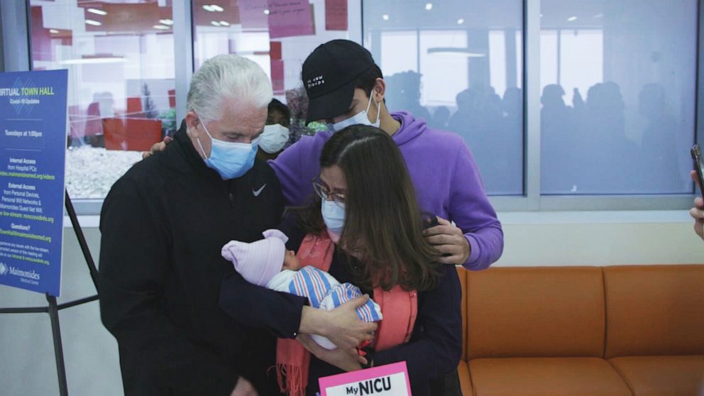 PHOTO: Iris Nolasco meets her baby Isabella Michelle for the first time after giving birth to her at Maimonides Medical Center in the Brooklyn borough of New York, April 21, 2020.