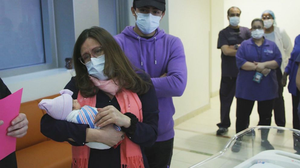 PHOTO: Iris Nolasco meets her baby Isabella Michelle for the first time after giving birth to her at Maimonides Medical Center in the Brooklyn borough of New York, April 21, 2020.