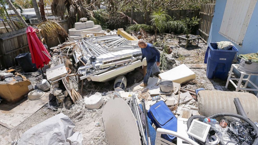 PHOTO: Reynaldo Martinez surveys the debris deposited in his backyard after Hurricane Irma struck the Florida Keys in Marathon, Fla., Sept. 12, 2017.