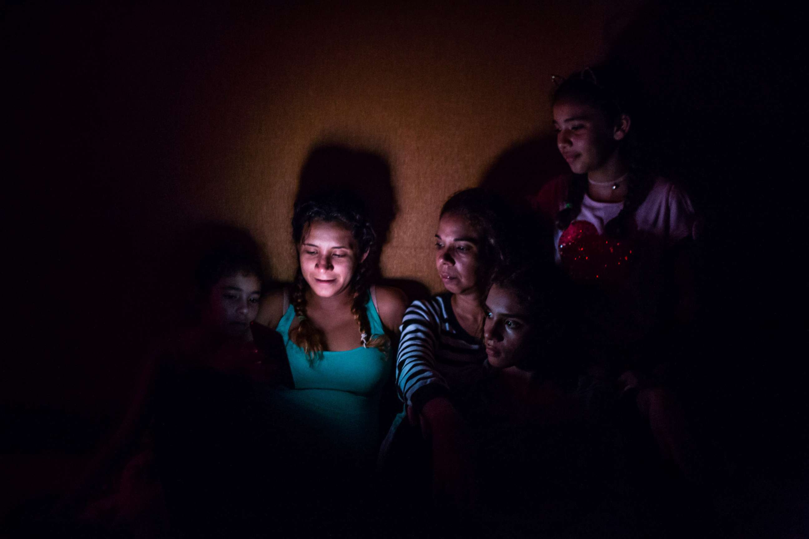 PHOTO: Members of the Pinto family gather on the ground floor of a hotel in Fort Myers, Fla., Sept. 10, 2017. 