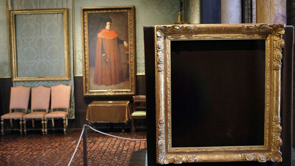 An empty frame on the right is where Vermeer's "The Concert," circa 1658 - 166, once was.  In the background, the spot where Rembrandt's "The Storm on the Sea of Galilee" used to be.  