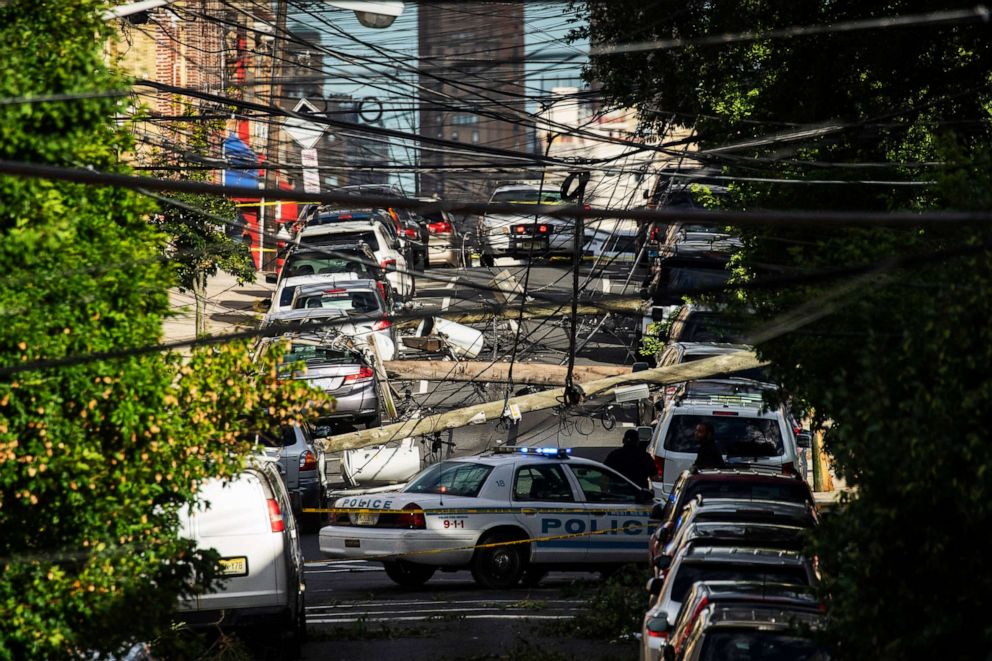 PHOTO: Power lines criss-cross at street level after Tropical Storm Isaias and its high winds heavy rain passed through on Aug. 4, 2020, in Guttenberg, N.J.