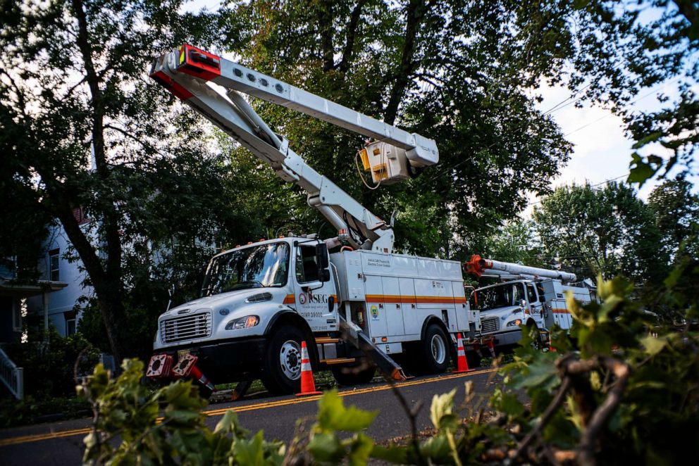 PHOTO: PSE&G workers repair power lines after Tropical Storm Isaias and its treacherous winds and heavy rain passed through on Aug. 4, 2020, in Bogota, N.J.