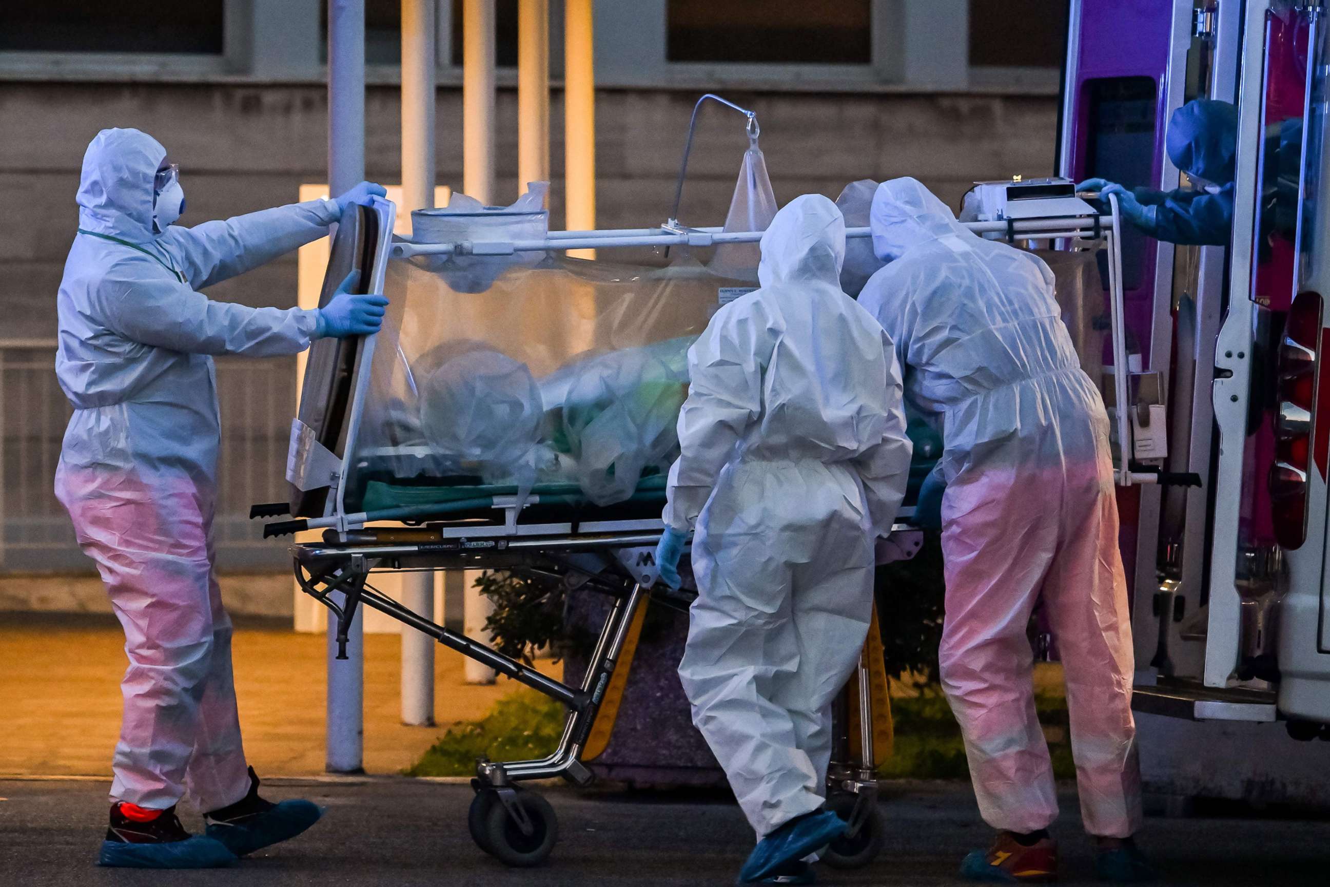 PHOTO: Medical workers move a patient under intensive care into the newly built Columbus Covid 2 temporary hospital to fight the new coronavirus infection, on March 16, 2020 at the Gemelli hospital in Rome.