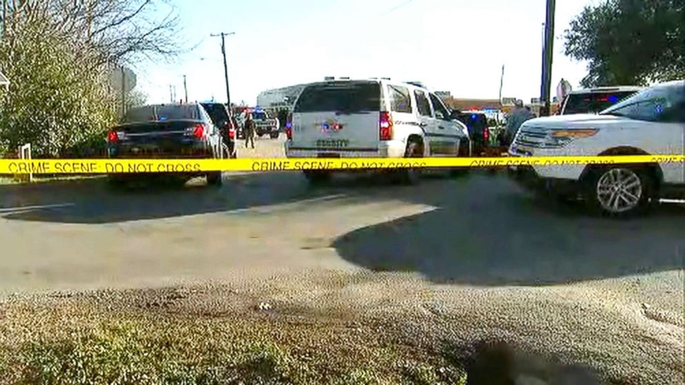 Police seal off an area close to the scene of a reported shooting at a school in Italy, Texas, Jan. 22, 2018.
