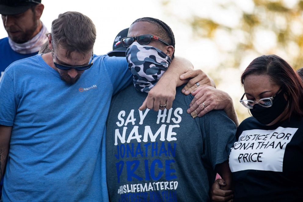 PHOTO: People gather for a march, rally and candle light vigil in honor Jonathan Price on Oct. 5, 2020 in Wolfe City, Texas.