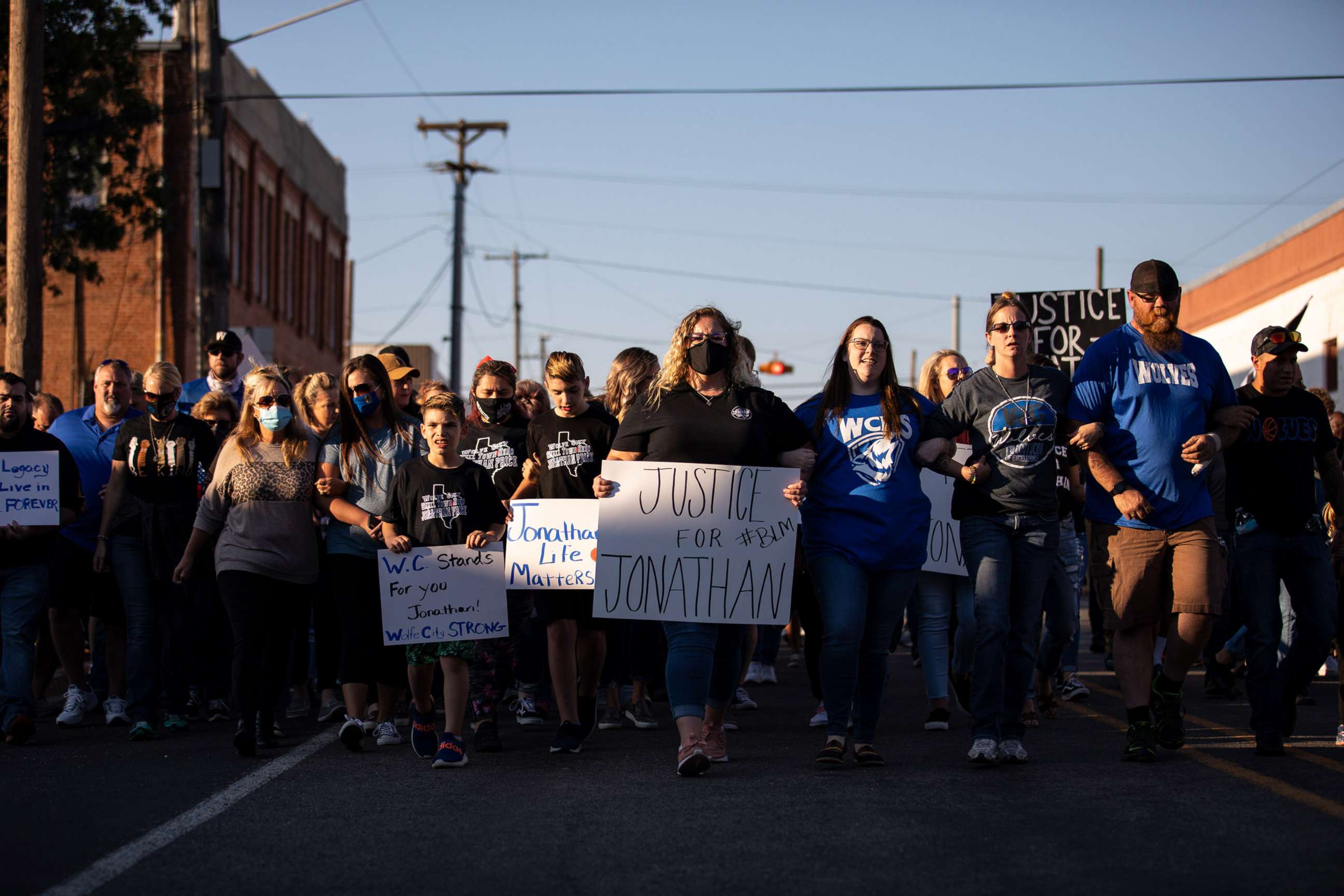 PHOTO: People gather for a march, rally and candle light vigil in honor Jonathan Price on Oct. 5, 2020 in Wolfe City, Texas.