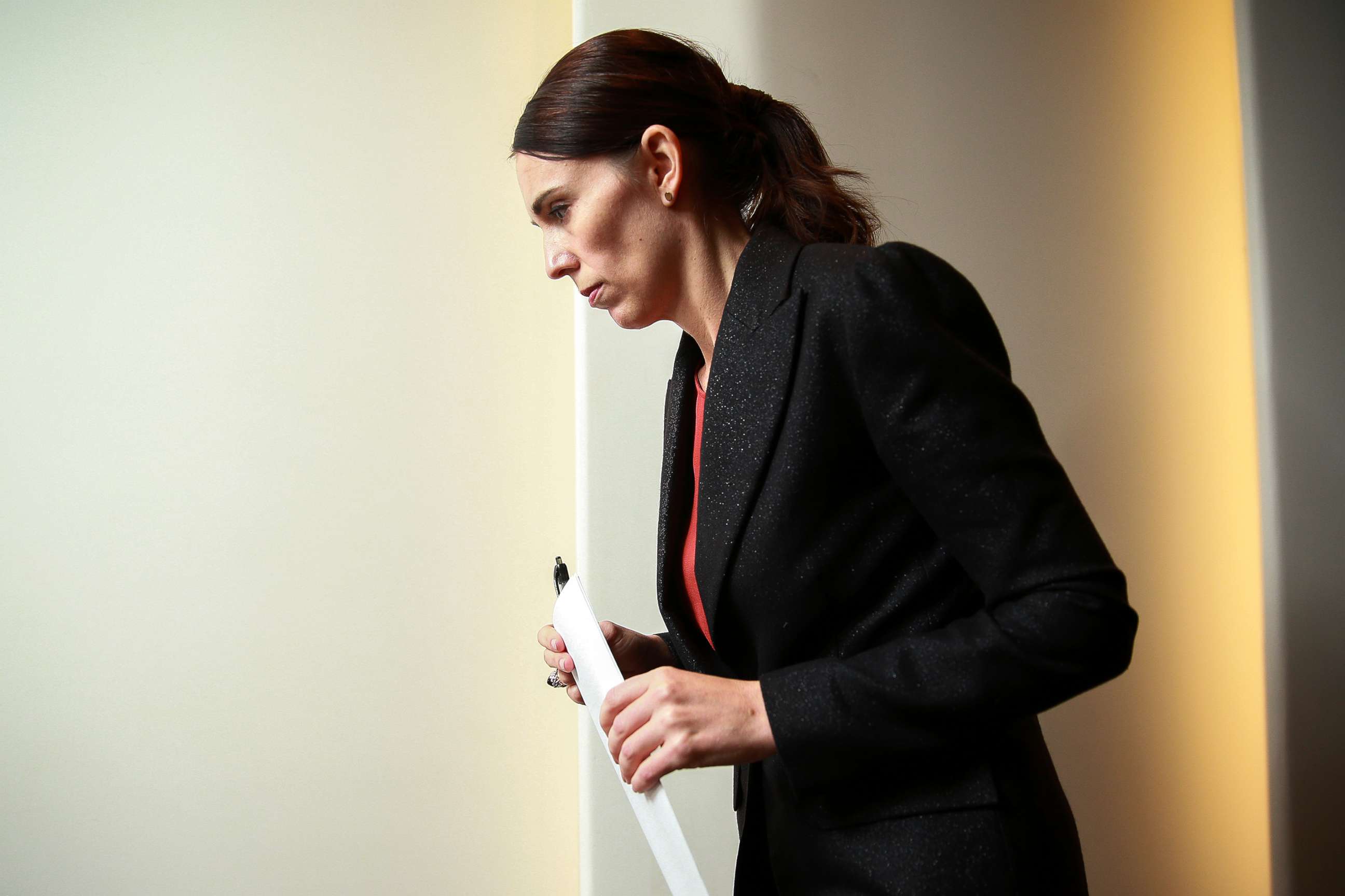 PHOTO: Prime Minister Jacinda Ardern exits after a press conference at Parliament, March 15, 2019, in Wellington, New Zealand.