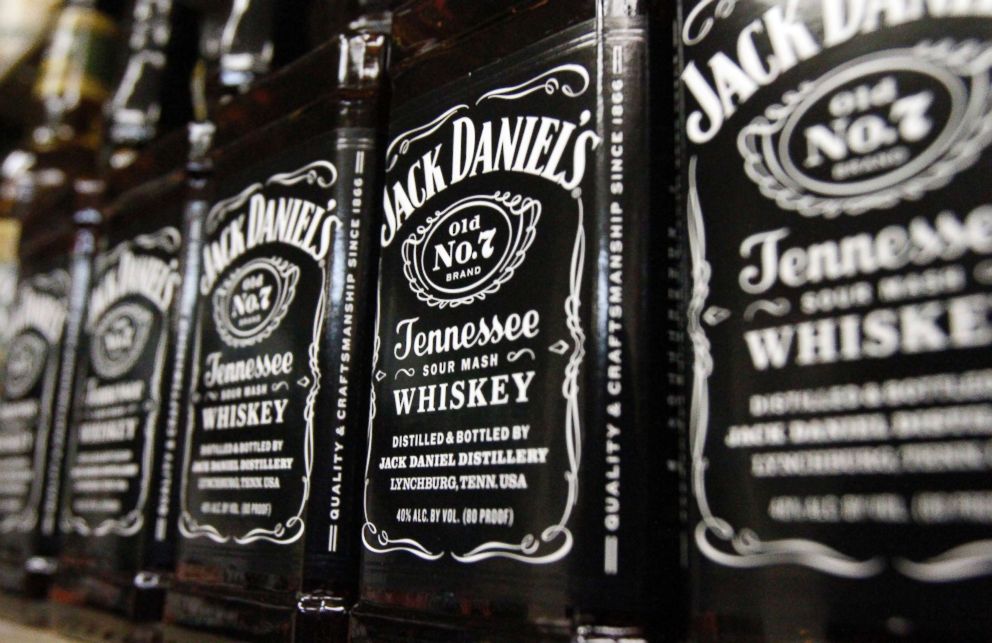 PHOTO: Bottles of Jack Daniel's Tennessee Whiskey line the shelves of a liquor outlet in Montpelier, Vt. Brown-Forman Corp., Dec. 5, 2011.