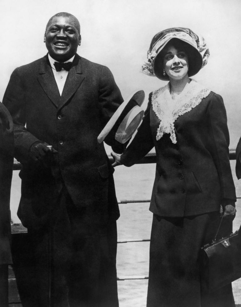 PHOTO: American heavyweight boxer Jack Johnson (1878-1946), is pictured with his wife on board a ship in this undated stock photo.