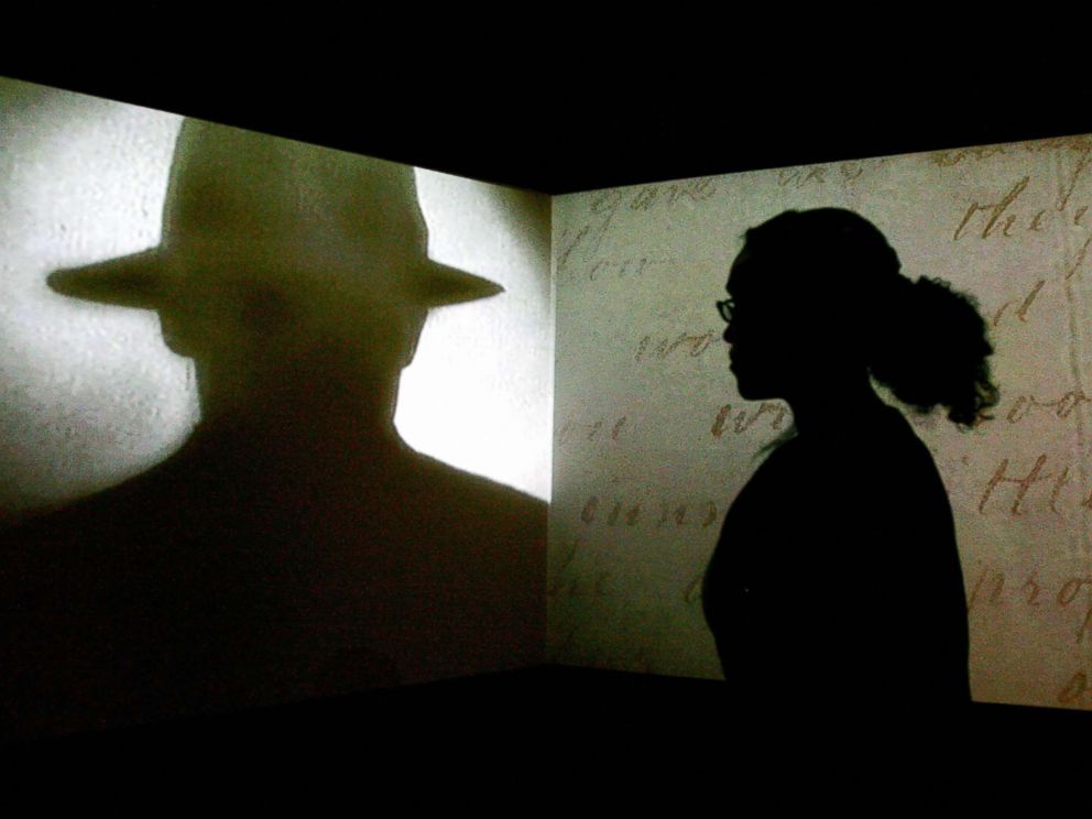 PHOTO: A visitor watches a black and white projection during a press preview of the Jack the Ripper and the East End exhibition at Museum in Docklands, in London, May 14, 2008.