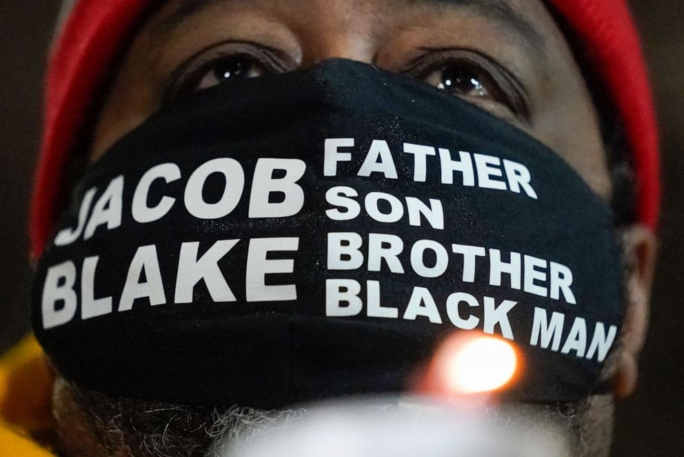 PHOTO: Jacob Blake Sr., father of Jacob Blake, holds a candle at a rally in Kenosha, Wisconsin, on Jan. 4, 2021.