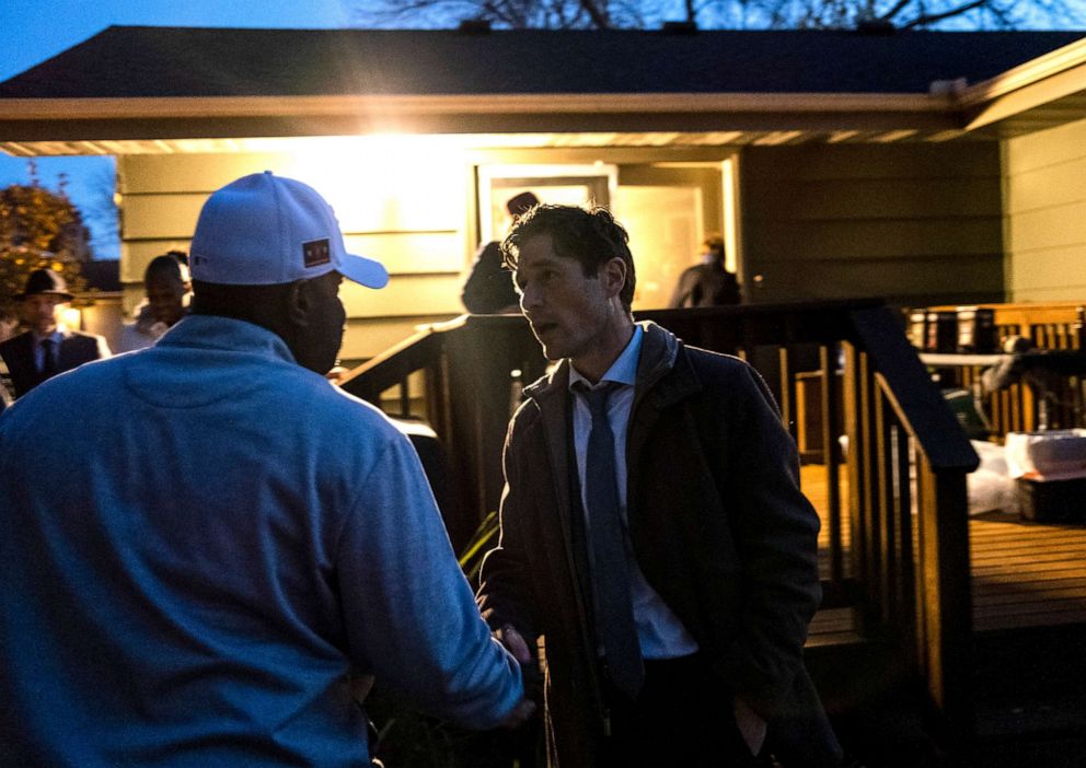 PHOTO: Minneapolis mayor Jacob Frey speaks with constituents at a backyard campaign event on Oct. 26, 2021 in Minneapolis, Minn. 