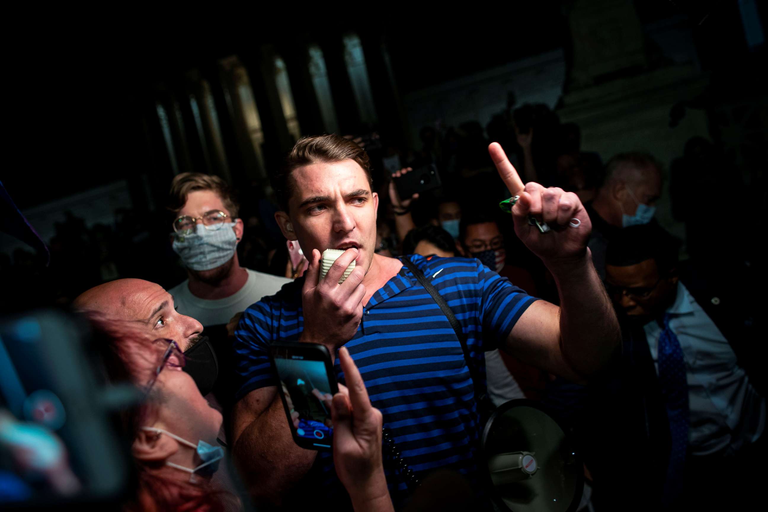 PHOTO: Jacob Wohl, far-right conspiracy theorist and supporter of President Donald Trump, interrupts mourners outside the U.S. Supreme Court following the death of U.S. Supreme Court Justice Ruth Bader Ginsburg, in Washington, Sept. 18, 2020.