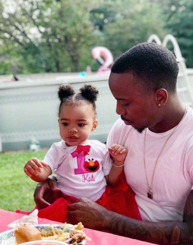 PHOTO: Jahmani Kinch, pictured with his daughter Kali, said that part of the problem he has faced is that the fines he has to pay are so large, and come second to other spending priorities which include co-parenting his daughter and his college tuition.