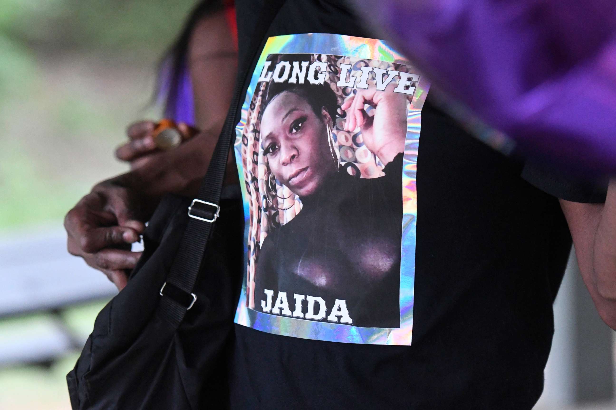 PHOTO: An attendee to a memorial for Jaida Peterson wears a T-shirt with her photo on it, April 9, 2021, at Tuckaseegee Park in Charlotte, N.C.