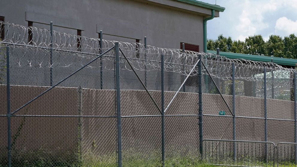 PHOTO: Rolls of razor wire line the top of the security fencing at the Raymond Detention Center in Raymond, Miss., on Aug. 1, 2022.