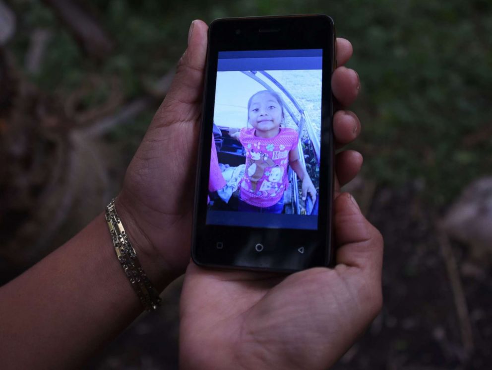 PHOTO: A relative shows a picture of 7-year old Jakelin Caal Maquin, who died in a Texas hospital two days after being taken into custody by border patrol agents, north of Guatemala city, Dec. 15, 2018.