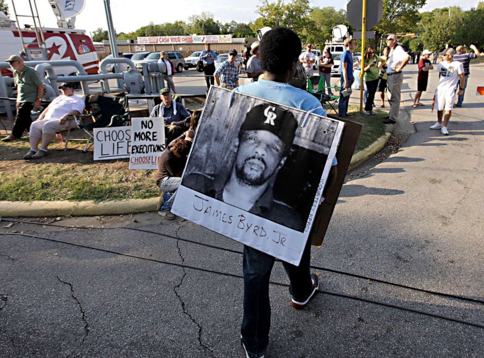 PHOTO:In this file photo, Ricky Jason wears a photograph of James Byrd Jr. outside the Texas Department of Criminal Justice Huntsville Unit on the day of the execution of Lawrence Russell Brewer, Sept. 21, 2011, in Huntsville, Texas.