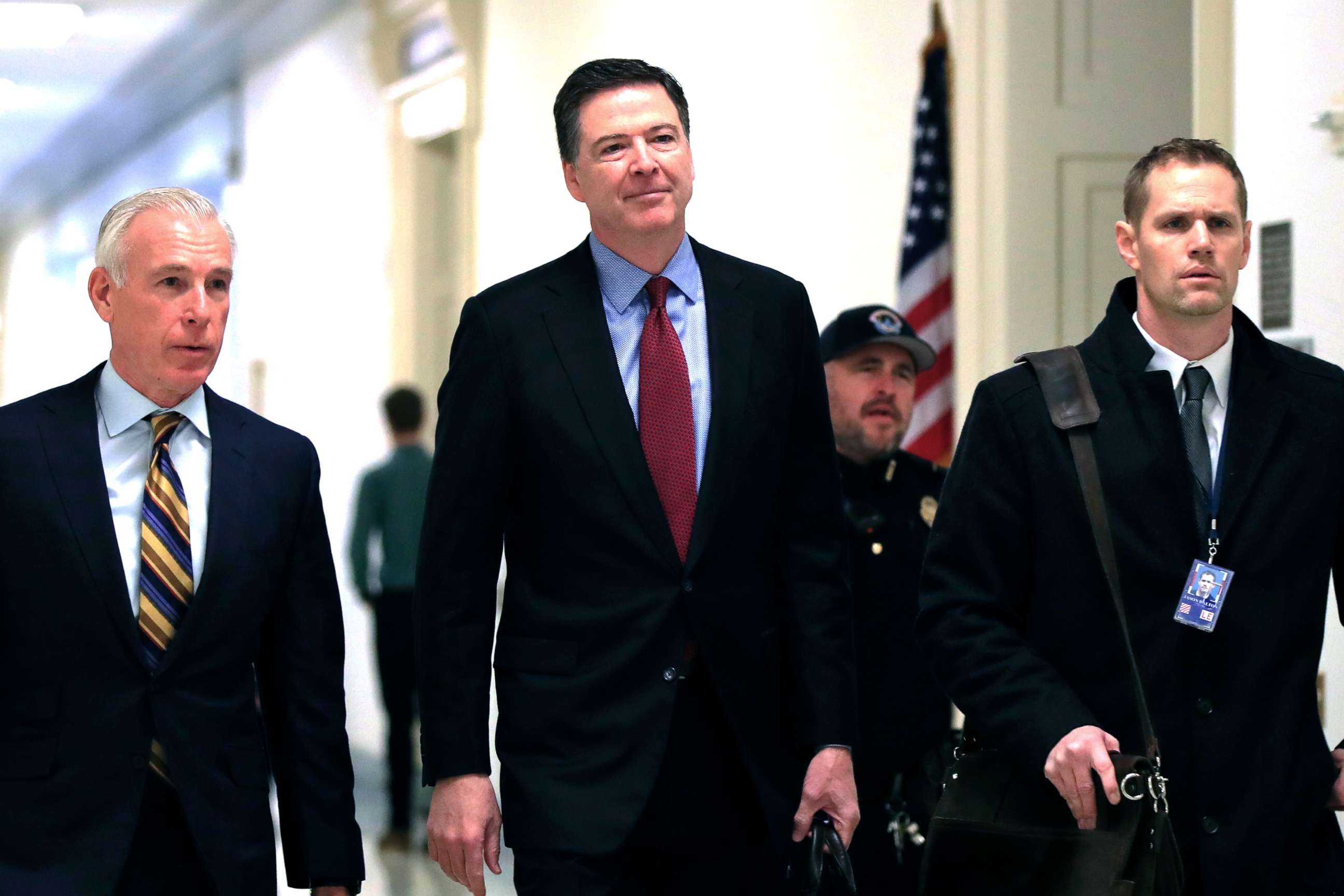 PHOTO: Former FBI Director James Comey, with his attorney, David Kelley, left, arrive to testify under subpoena behind closed doors before the House Judiciary and Oversight Committee on Capitol Hill in Washington, Dec. 7, 2018.