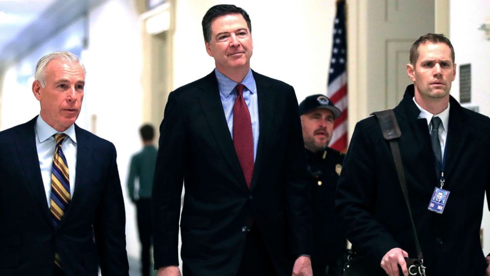 PHOTO: Former FBI Director James Comey, with his attorney, David Kelley, left, arrive to testify under subpoena behind closed doors before the House Judiciary and Oversight Committee on Capitol Hill in Washington, Dec. 7, 2018.