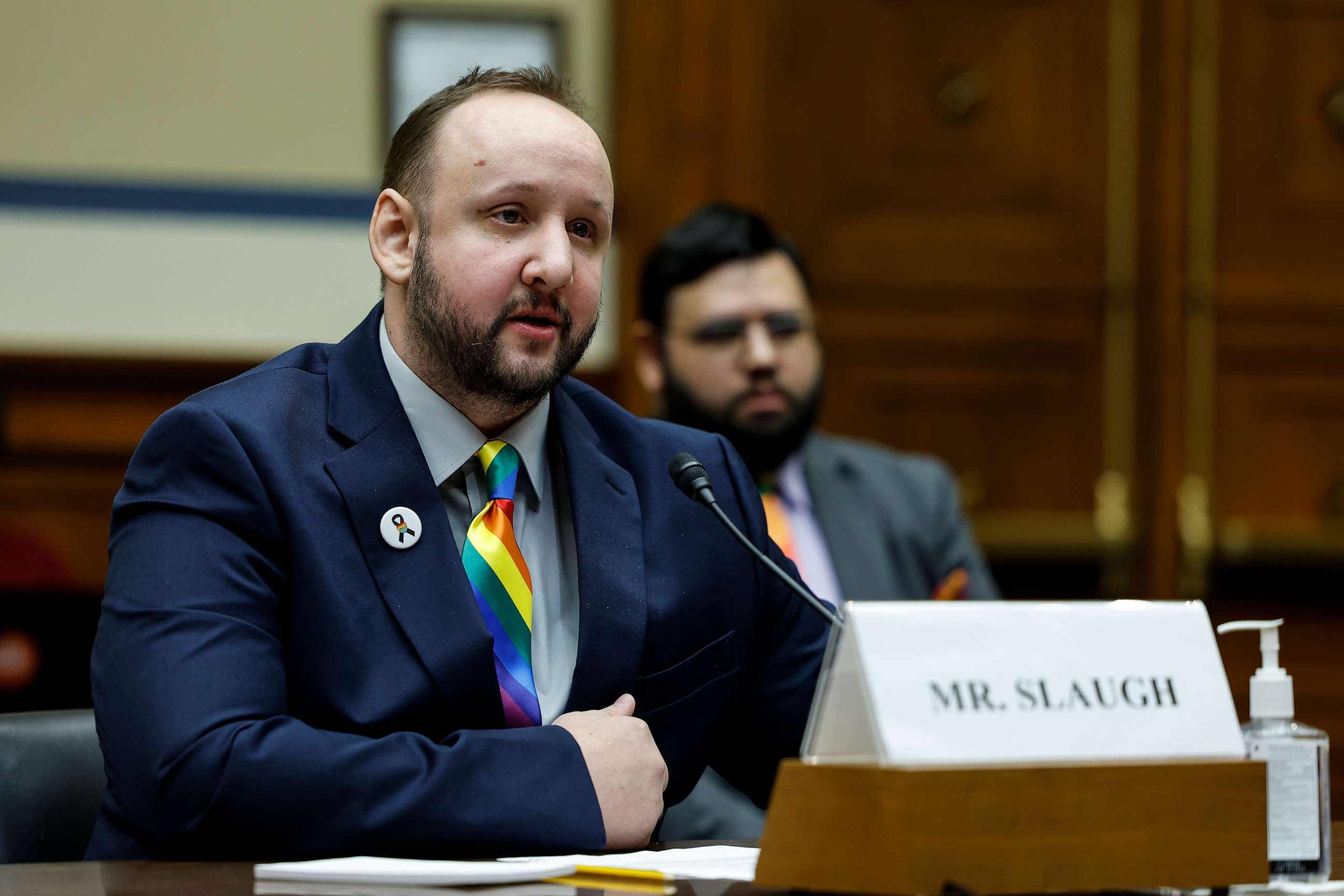 PHOTO: James Slaugh, a survivor of the Club Q shooting in Colorado Springs, listens during a House Oversight Committee hearing at the Rayburn House Office Building on Dec. 14, 2022, in Washington, D.C.