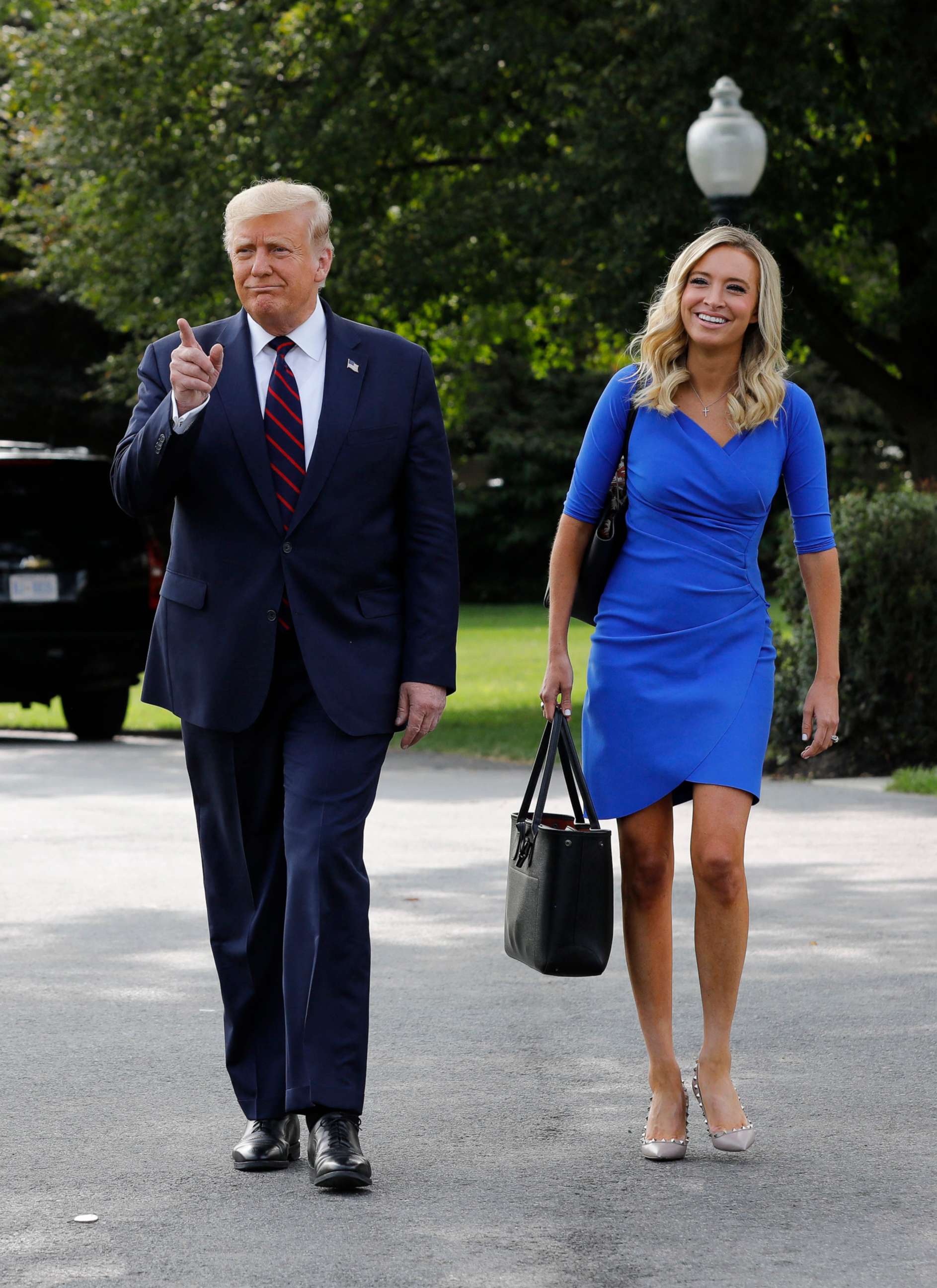 PHOTO: President Donald Trump walks with White House Press Secretary Kayleigh McEnany towards
