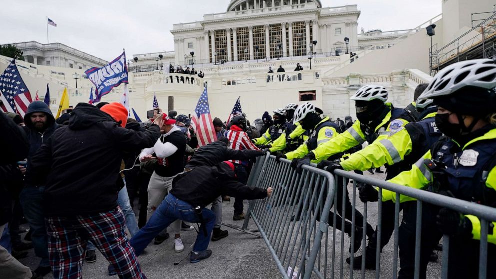 PHOTO: Violent insurrections loyal to President Donald Trump try to break through a police barrier at the Capitol in Washington on Jan. 6, 2021.