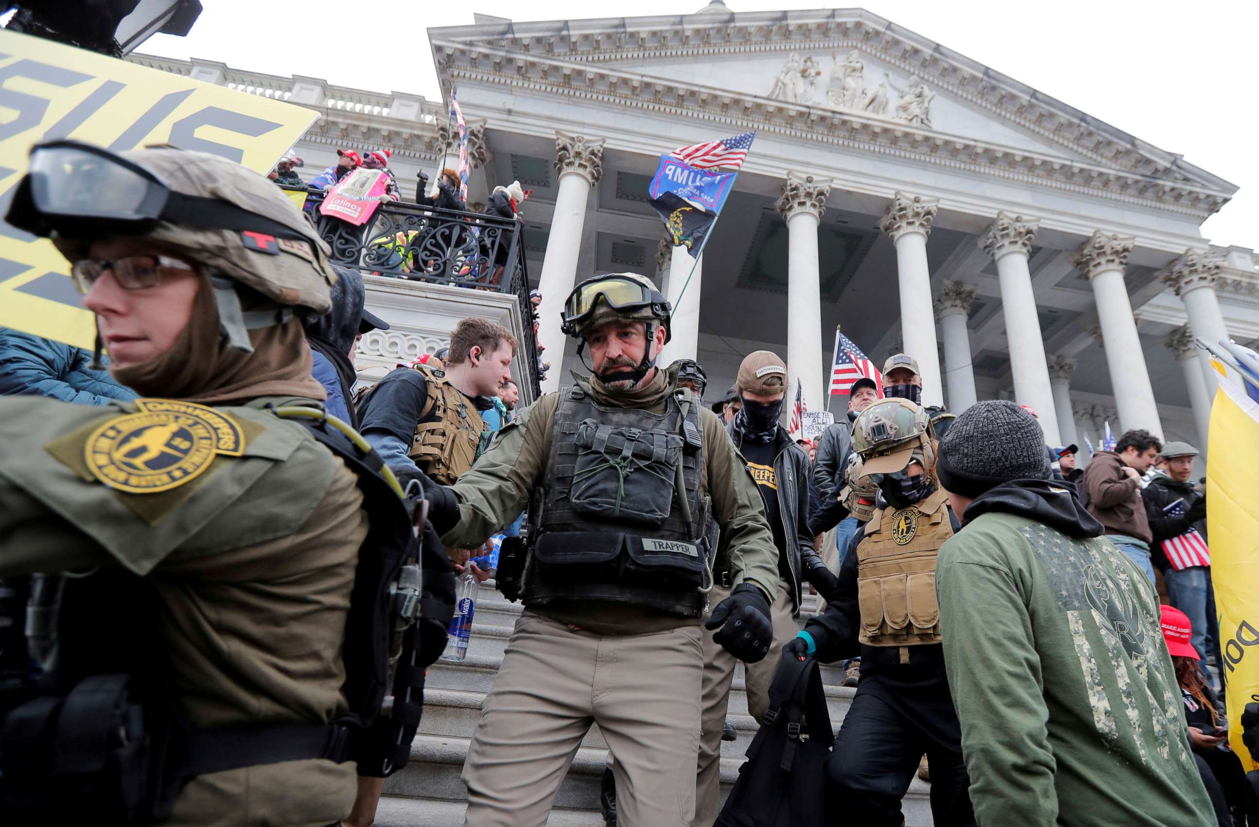 PHOTO: Rioters march down the steps of the Capitol protesting against the certification of the 2020 presidential election results by the U.S. Congress, in Washington, Jan. 6, 2021.