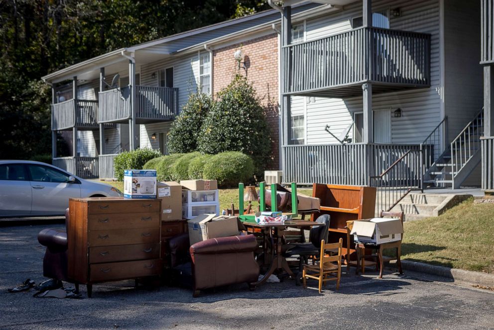 PHOTO: Furniture and personal items sit in the parking lot after an eviction at an apartment complex where Jane Johnson lives with her 3-year-old son.