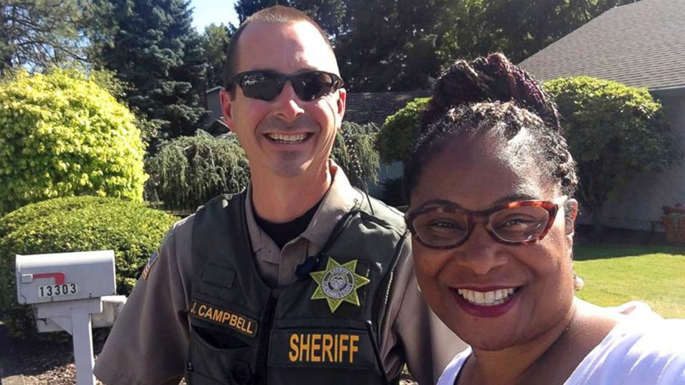 PHOTO: Oregon state Rep. Janelle Bynum poses with a Clackamas County Sheriff's officer after he stopped her in Clackamas, Ore., July 3, 2018.