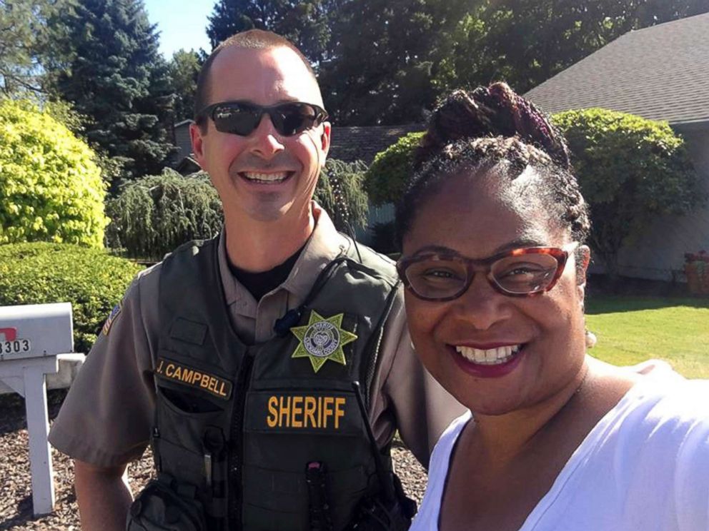 PHOTO: Oregon state Rep. Janelle Bynum poses with a Clackamas County Sheriffs officer after he stopped her in Clackamas, Ore., July 3, 2018.