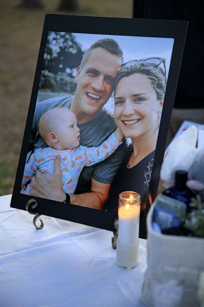 PHOTO: In this April 19, 2022 file photo, a family portrait of Jared and Kirsten Bridegan is shown with their daughter Bexley, now 2, at a candlelight vigil in memory of the husband and father of 33 years, at Jacksonville Beach.