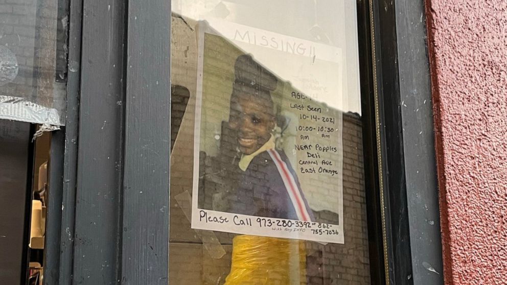 PHOTO: A missing poster for 14-year-old Jashyah Moore hangs in a drive-through window at a fast food restaurant in East Orange, N.J., Oct. 16, 2021.