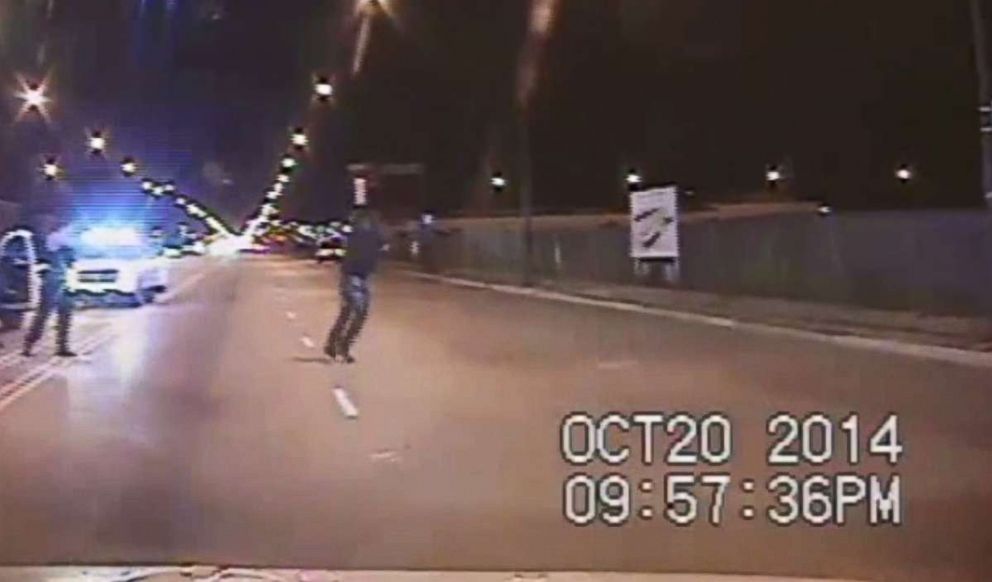 PHOTO: In this still image taken from a police vehicle dash camera released by the Chicago Police Department on November 24, 2015 ,  Chicago Police officer Jason Van Dyke is shown shooting Laquan McDonald on October 20, 2014  in Chicago, Ill.