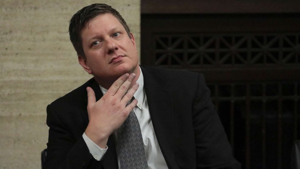 PHOTO: Chicago police Officer Jason Van Dyke listens at the Leighton Criminal Court Building, Oct. 5, 2018, in Chicago.