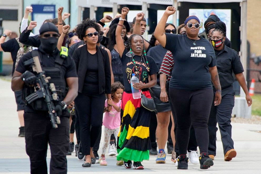 PHOTO: A group arrives to pay their respects at a memorial service for Jayland Walker in Akron, Ohio, July 13, 2022.