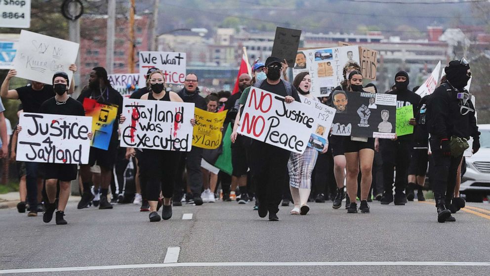 PHOTO: Justice for Jayland Walker protesters march down East Exchange Street on April 14, 2023 in Akron, Ohio.