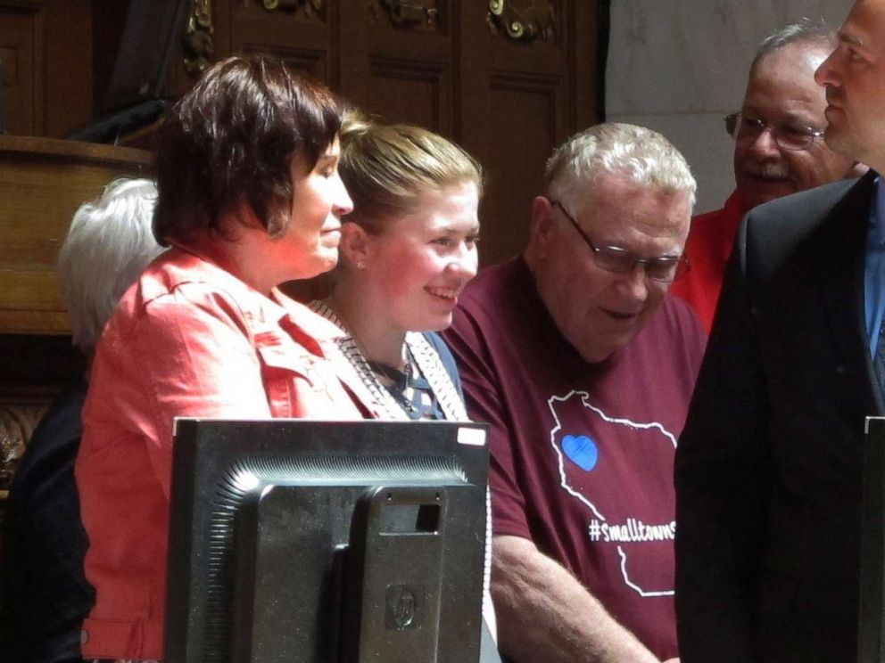 PHOTO: Kidnapping victim Jayme Closs, second from left, appears with her family and supporters to receive a "hometown hero" award from the Wisconsin Assembly on Wednesday, May 15, 2019, in Madison, Wis.