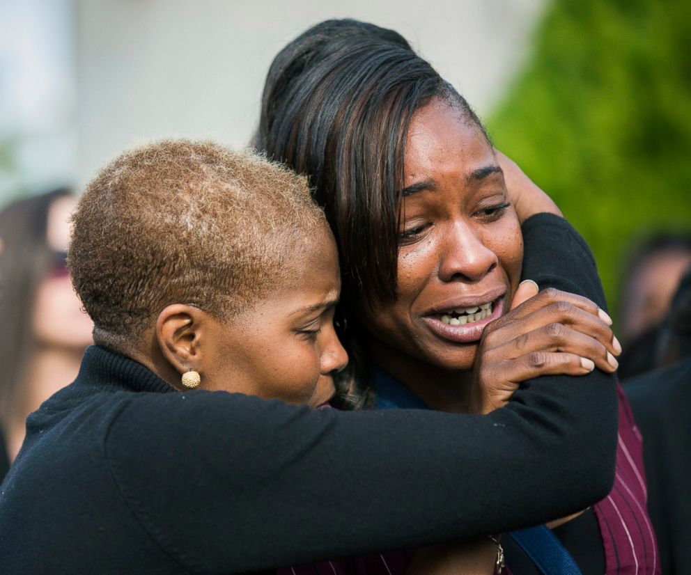 PHOTO: LaPorsha Washington, right, is embraced as the casket of her daughter Jazmine Barnes is placed inside a funeral hearse after a memorial service, Jan. 8, 2019, in Houston.