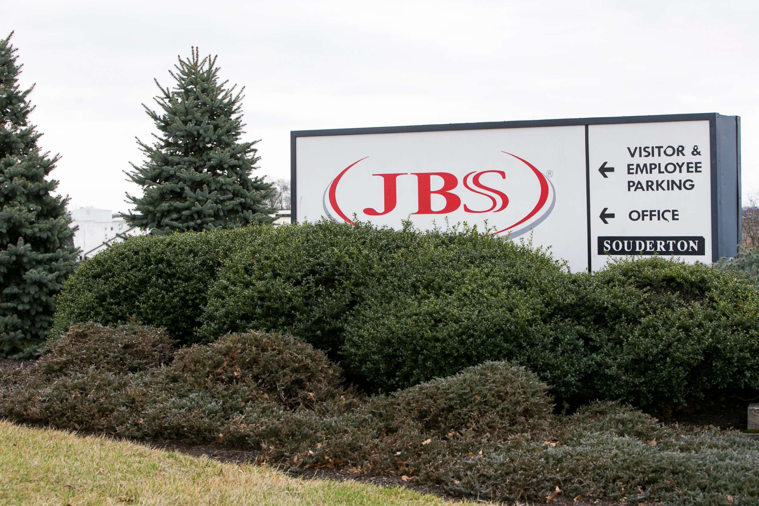 PHOTO: In this Feb. 26, 2017, file photo, a logo sign outside of JBS USA Holdings, Inc., meat packing plant in Souderton, Penn., is shown.