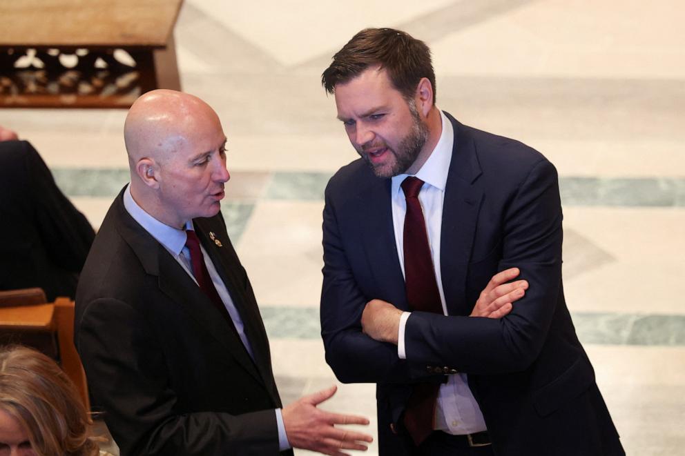 PHOTO: Sen. Pete Ricketts speaks with Vice President-elect JD Vance on the day of the State Funeral for former U.S. President Jimmy Carter at the Washington National Cathedral in Washington, Jan. 9, 2025.