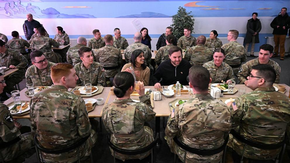 PHOTO: Vice President JD Vance and Second Lady Usha Vance eat a meal with soldiers at the U.S. military's Pituffik Space Base in Greenland, March 28, 2025. 