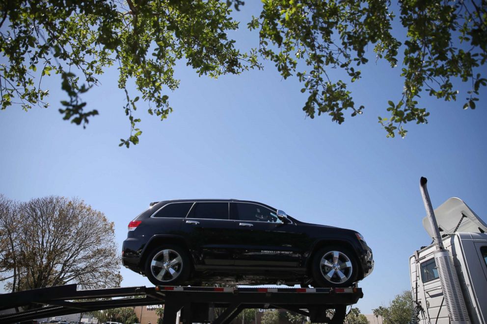 PHOTO: A 2014 Jeep Cherokee is seen on a transport truck on April 2, 2014 in Miami.