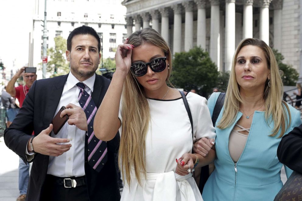 PHOTO: Jennifer Araoz, center, one of Jeffrey Epstein's alleged victims, and her attorney finish speaking to the press outside the Federal Court in New York, Aug. 27, 2019.