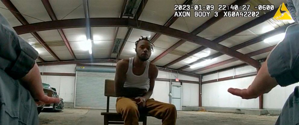PHOTO: In this image from Baton Rouge Police Department body camera video, officers interact with Jeremy Lee inside a warehouse in Baton Rouge, on Jan. 9, 2023.