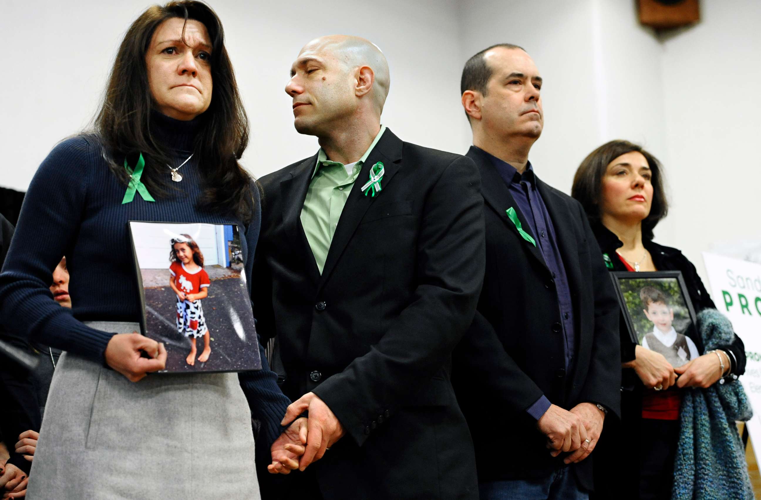 PHOTO: Jennifer Hensel and Jeremy Richman, parents of Sandy Hook School shooting victim Avielle Rose Richman, listen at a news conference at Edmond Town Hall in Newtown, Conn., Jan. 14, 2013.
